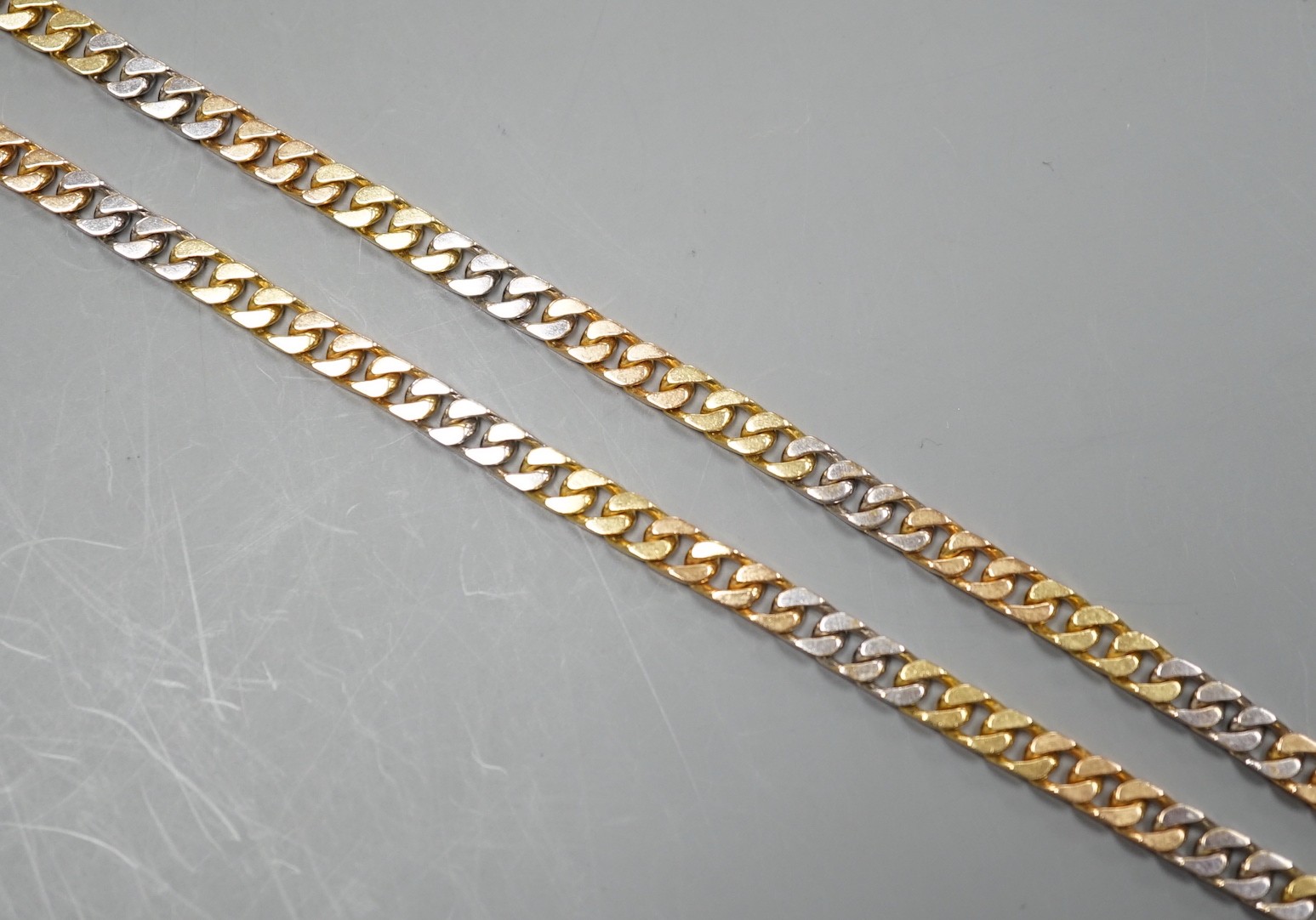 A modern three colour 18ct gold curb link chain, 39cm, 28.8 grams.